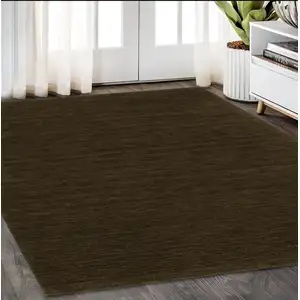 Photo of Brown Wool Hand Tufted Area Rug