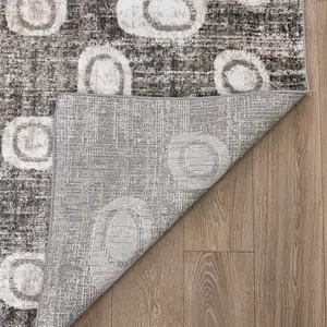 Photo of Brown and Beige Abstract Area Rug