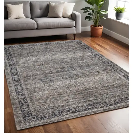 Brown and Blue Oriental Printed Distressed Area Rug Photo 1
