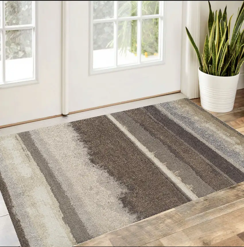 Brown and Ivory Abstract Area Rug Photo 1