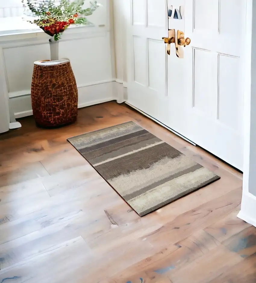 Brown and Ivory Abstract Area Rug Photo 1