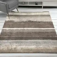 Photo of Brown and Ivory Abstract Area Rug