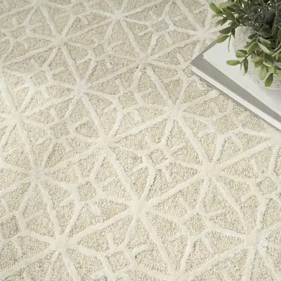 5' X 7' Brown and Ivory Geometric Hand Tufted Area Rug Photo 9