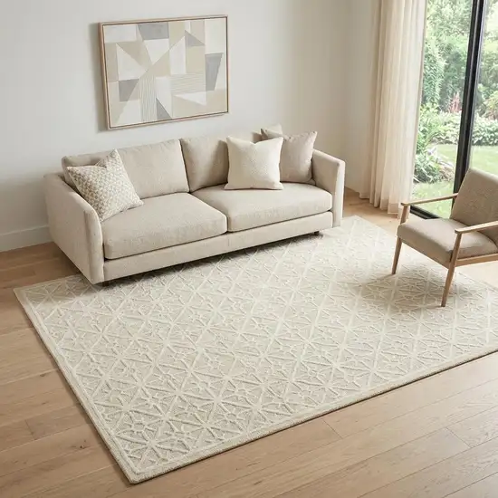 5' X 7' Brown and Ivory Geometric Hand Tufted Area Rug Photo 1
