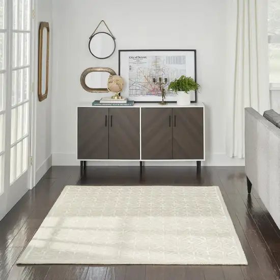 5' X 7' Brown and Ivory Geometric Hand Tufted Area Rug Photo 6