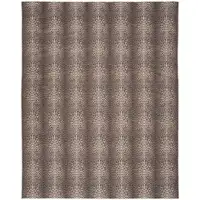 Photo of Brown and Ivory Leopard Print Power Loom Washable Non Skid Area Rug
