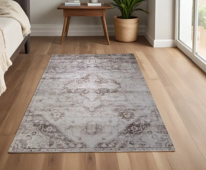 Brown and Ivory Oriental Area Rug Photo 1