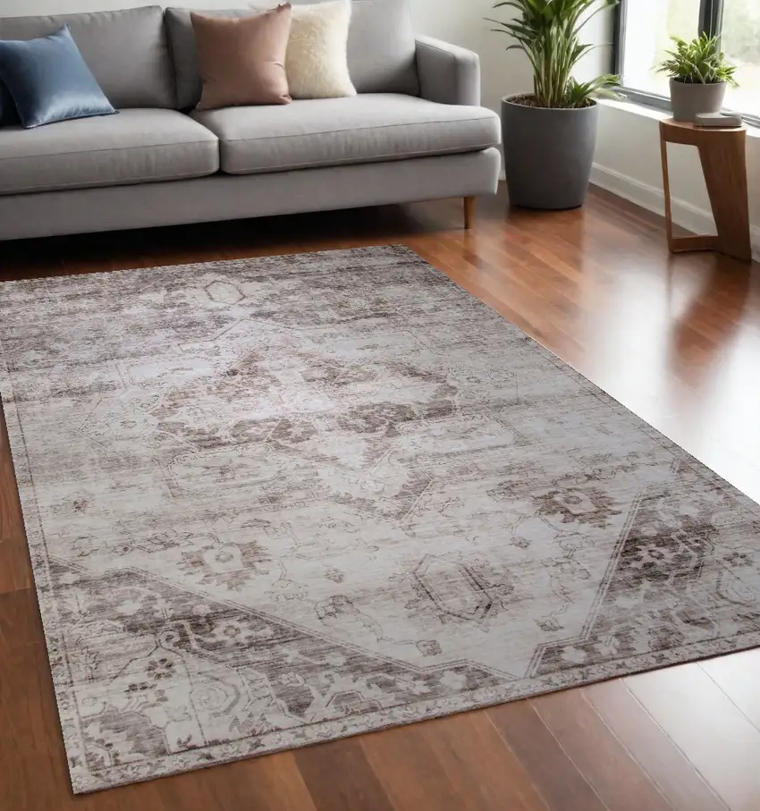 Brown and Ivory Oriental Area Rug Photo 1