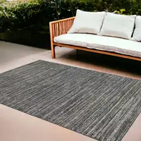 Photo of Brown and Ivory Striped Stain Resistant Indoor Outdoor Area Rug