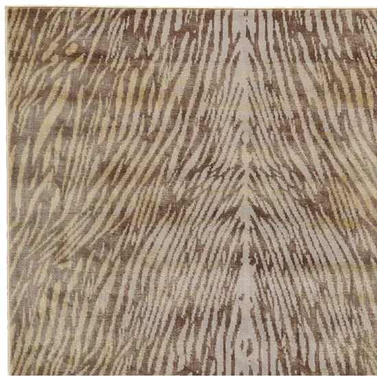 Brown and Tan Animal Print Power Loom Area Rug Photo 6