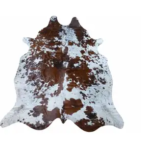 Photo of Brown and White Brindled Cowhide Rug