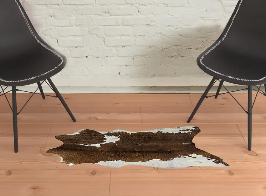 Brown and White Cowhide Hand Tufted Area Rug Photo 2
