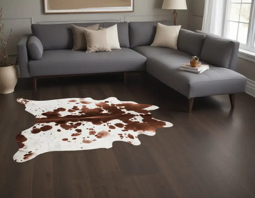 Brown And White Spotted Natural Cowhide Area Rug Photo 1