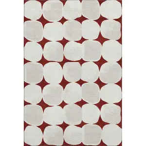 Photo of Burgundy And Ivory Abstract Geometric Washable Area Rug With UV Protection