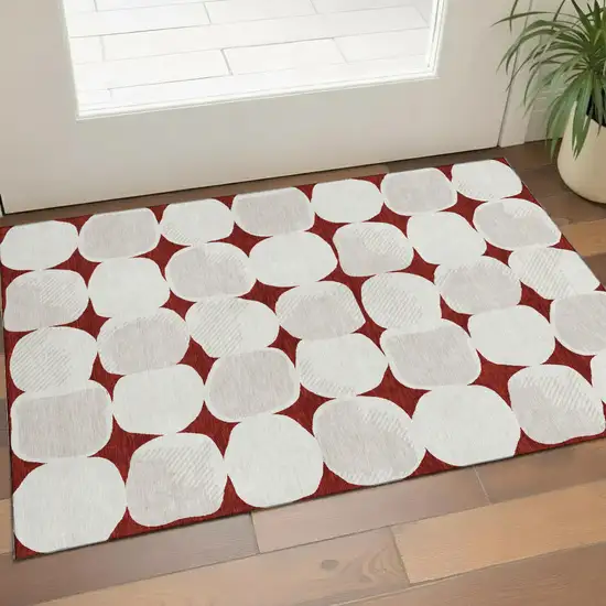 Burgundy And Ivory Abstract Geometric Washable Area Rug With UV Protection Photo 1