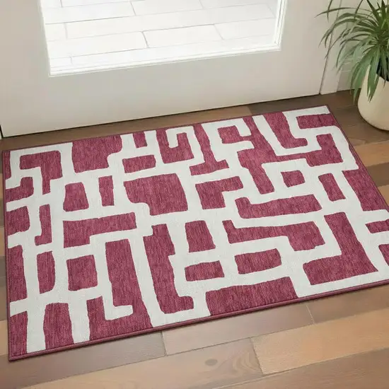 Burgundy And Ivory Abstract Geometric Washable Area Rug With UV Protection Photo 1