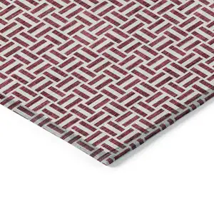 Photo of Burgundy And Ivory Geometric Washable Indoor Outdoor Area Rug