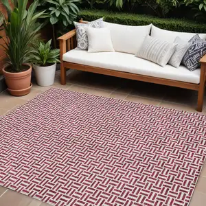 Photo of Burgundy And Ivory Geometric Washable Indoor Outdoor Area Rug