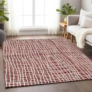 Photo of Burgundy And Ivory Striped Washable Area Rug With UV Protection