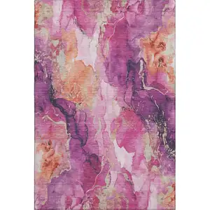 Photo of Burgundy And Salmon Abstract Washable Area Rug With UV Protection