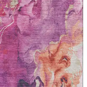 Photo of Burgundy And Salmon Abstract Washable Area Rug With UV Protection