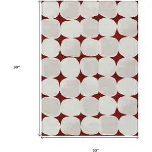 Photo of Burgundy Beige And Ivory Abstract Washable Indoor Outdoor Area Rug