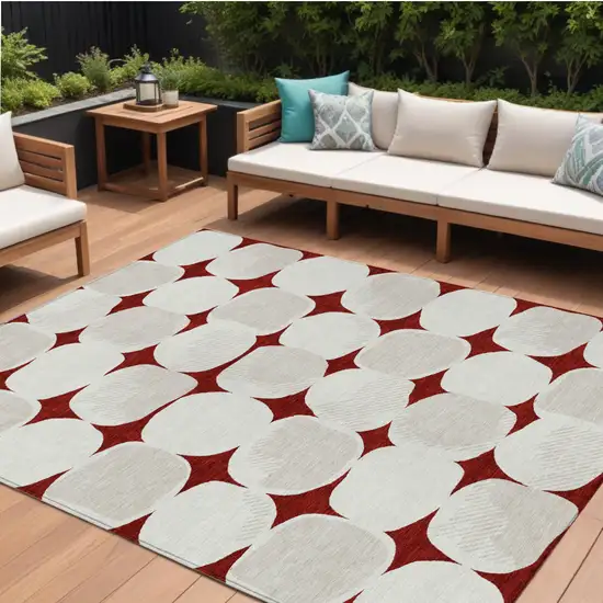 Burgundy Beige And Ivory Abstract Washable Indoor Outdoor Area Rug Photo 1