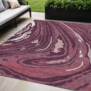 Photo of Burgundy Brick Red And Ivory Abstract Washable Indoor Outdoor Area Rug