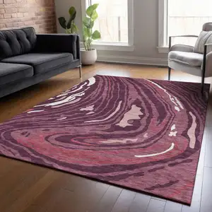 Photo of Burgundy Brick Red And Ivory Abstract Washable Indoor Outdoor Area Rug
