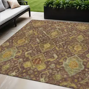 Photo of Burgundy Gold And Copper Ikat Washable Indoor Outdoor Area Rug