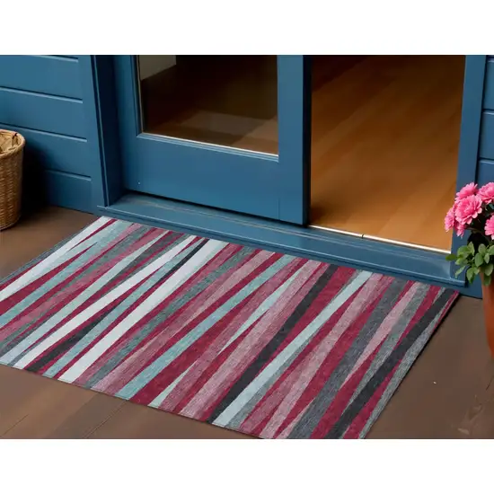 Burgundy Ivory And Blue Striped Washable Indoor Outdoor Area Rug Photo 1