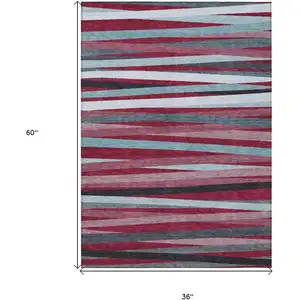 Photo of Burgundy Ivory And Blue Striped Washable Indoor Outdoor Area Rug