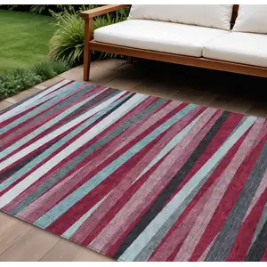 Photo of Burgundy Ivory And Blue Striped Washable Indoor Outdoor Area Rug