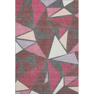 Photo of Burgundy Pink And Ivory Geometric Washable Area Rug With UV Protection