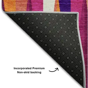 Photo of Burgundy Purple And Orange Geometric Washable Area Rug With UV Protection
