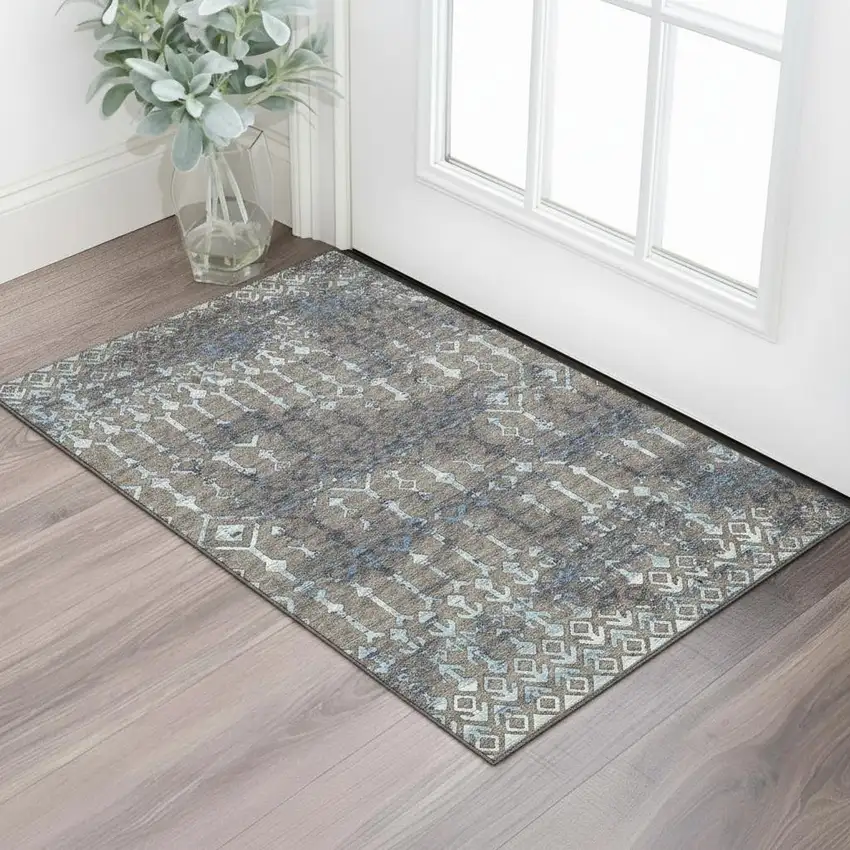 Burnished Brown And Blue Tribal Washable Area Rug With UV Protection Photo 1