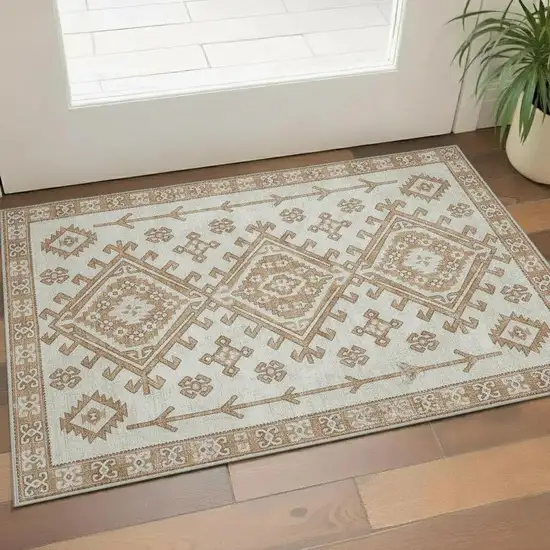 Burnt Sienna And Beige Geometric Washable Area Rug With UV Protection Photo 1