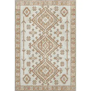 Photo of Burnt Sienna And Beige Geometric Washable Area Rug With UV Protection