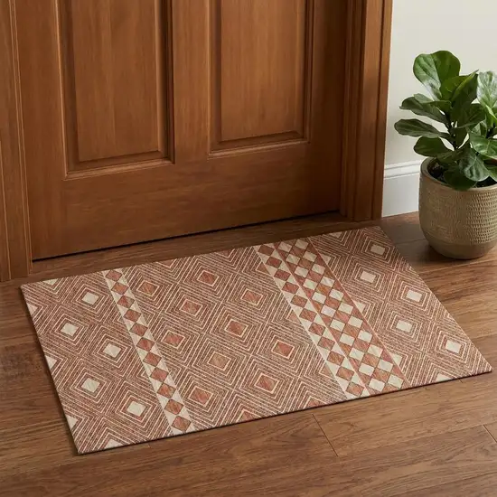 Burnt Sienna And Ivory Tribal Washable Area Rug With UV Protection Photo 1