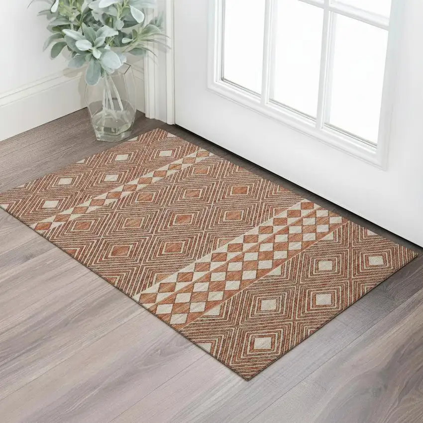 Burnt Sienna And Ivory Geometric Washable Area Rug With UV Protection Photo 1