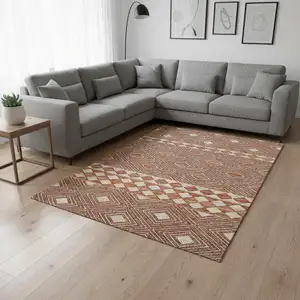 Photo of Burnt Sienna And Ivory Geometric Washable Area Rug With UV Protection