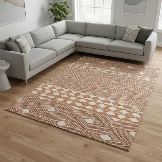 Burnt Sienna And Ivory Geometric Washable Area Rug With UV Protection Photo 1