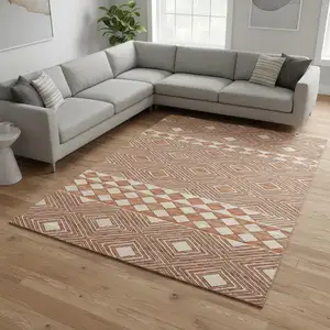 Photo of Burnt Sienna And Ivory Geometric Washable Area Rug With UV Protection