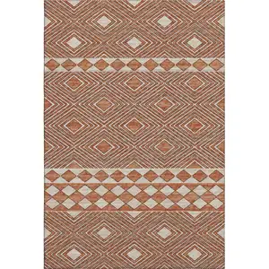 Photo of Burnt Sienna And Ivory Geometric Washable Area Rug With UV Protection