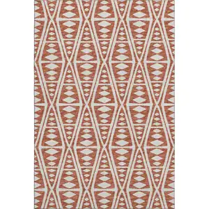 Photo of Burnt Sienna And Ivory Tribal Washable Area Rug With UV Protection