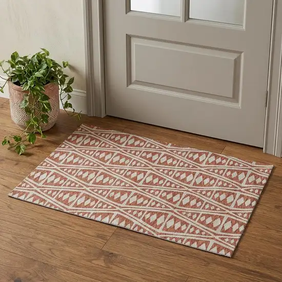 Burnt Sienna And Ivory Tribal Washable Area Rug With UV Protection Photo 1