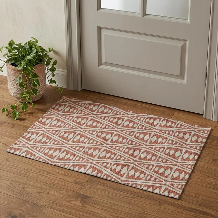 Burnt Sienna And Ivory Tribal Washable Area Rug With UV Protection Photo 1