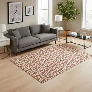 Photo of Burnt Sienna And Ivory Tribal Washable Area Rug With UV Protection
