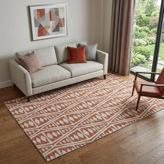 Burnt Sienna And Ivory Tribal Washable Area Rug With UV Protection Photo 1