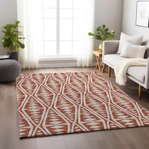 Photo of Burnt Sienna And Ivory Tribal Washable Area Rug With UV Protection